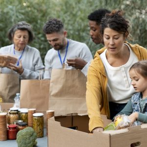 people-collecting-food-donations-medium-shot